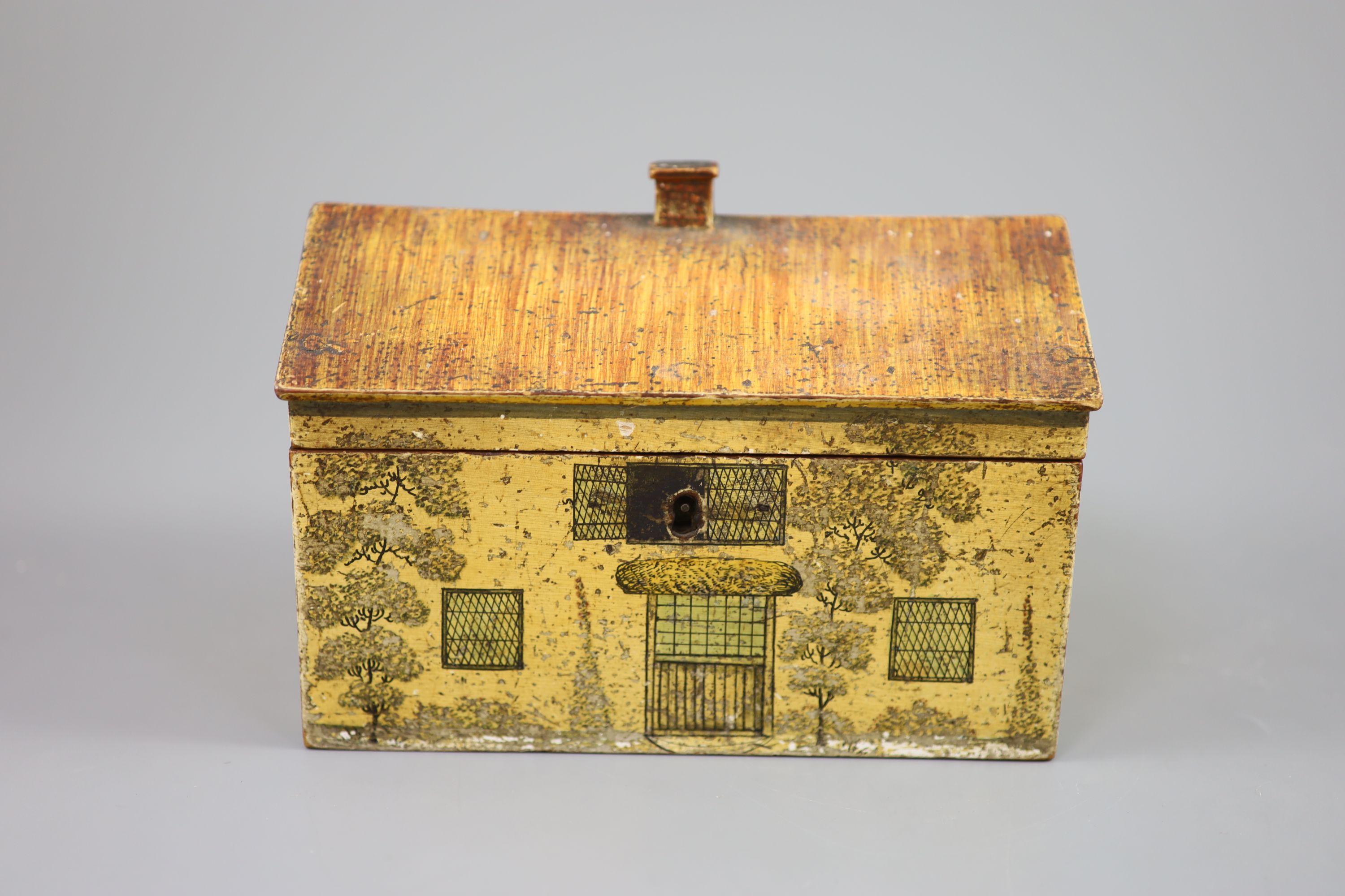 A Regency painted and penwork work box, modelled as a cottage, width 7.25in. depth 4.5in. height 5in.